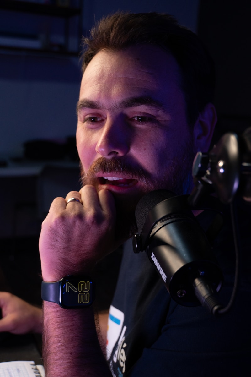 A man sitting in front of a computer keyboard
