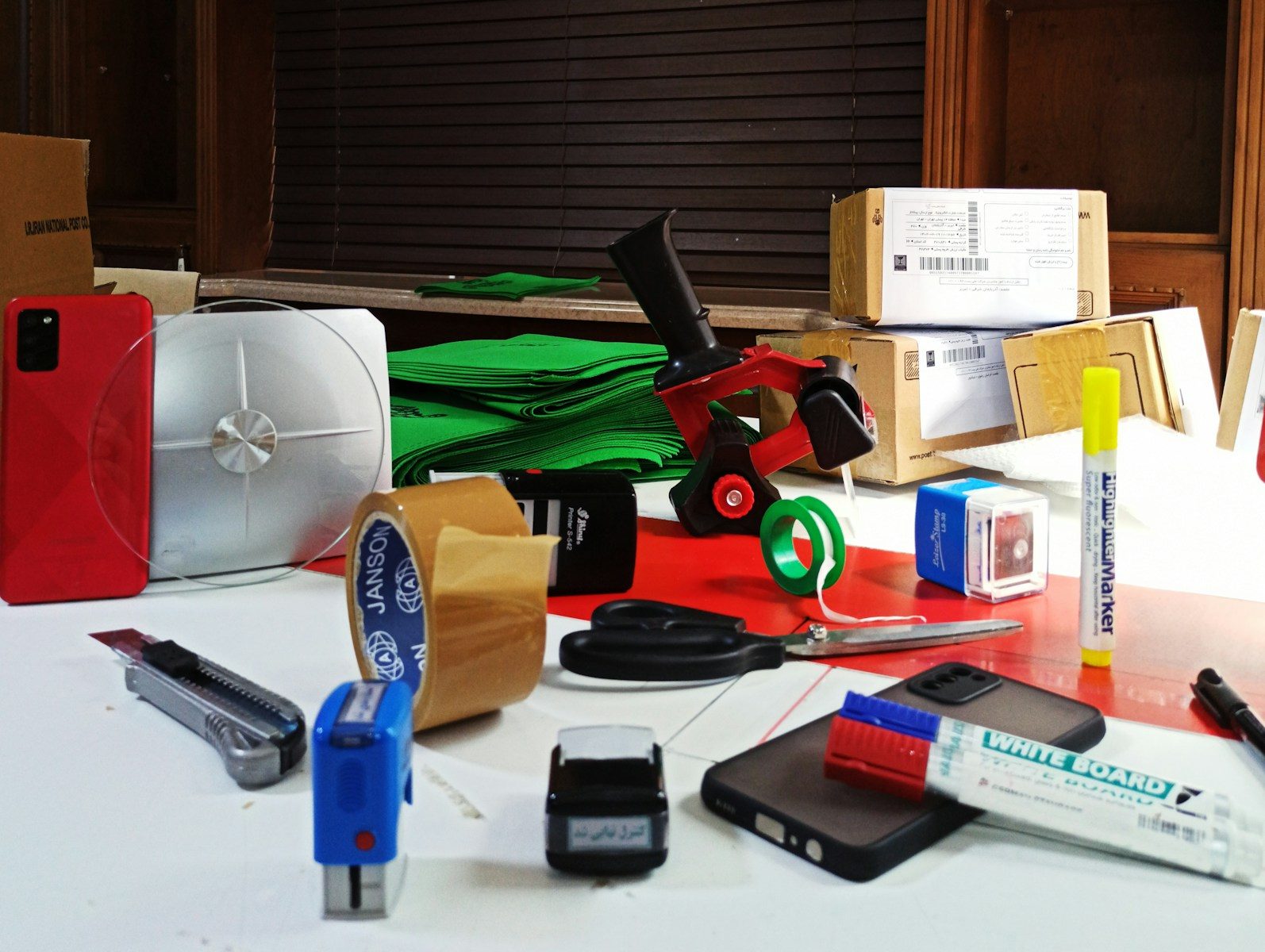 a table topped with lots of different types of electronics